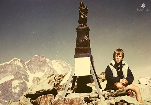 Un giovane Giulio Pedretti in montagna. Per lui è intimamente legata alla sua esistenza, da sempre.